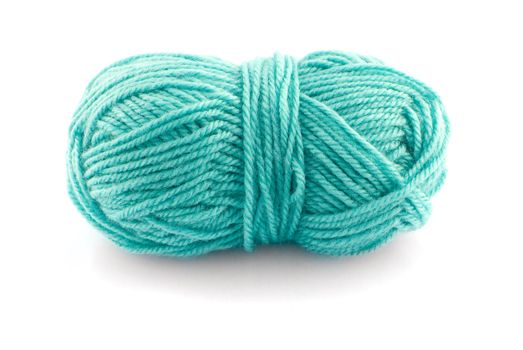 Green ball knitting wool or yarn, with silver knitting needles.