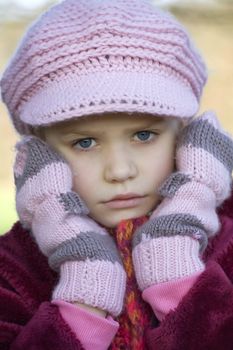 Girl with pink cap