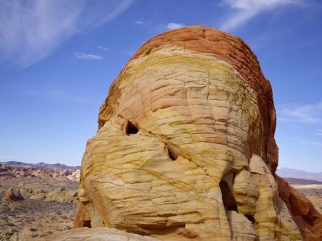 Large colorful rock dome of sandstone