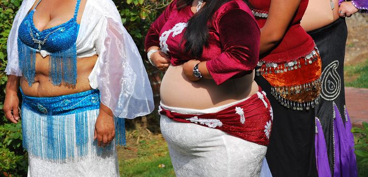 Belly dancers in all sizes waiting to go onstage.