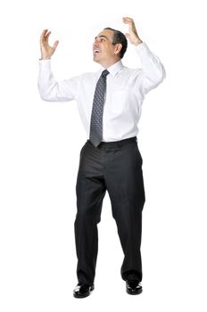 Happy celebrating business man in suit isolated on white background