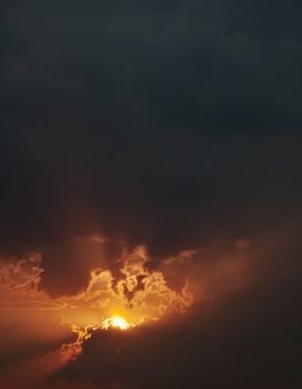 The fiery sunset - a vertical composition. Background