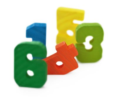 Toy wooden color ciphers, isolated on white background