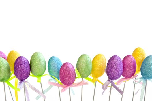 Cute Easter toy eggs isolated on white background