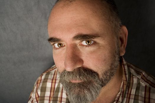 Close up of friendly man in his 40s.