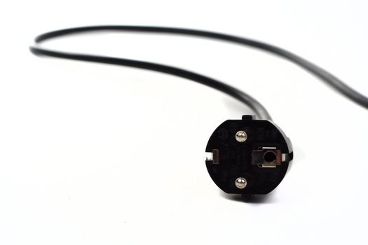 Black french electric plug with cable, isolated over white background