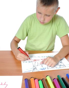 Schoolboy doing bored his homework on white background