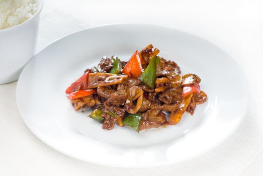 typical chinese dish,fresh beef stir fried with pepperrs bamboo sprout and mushrooms