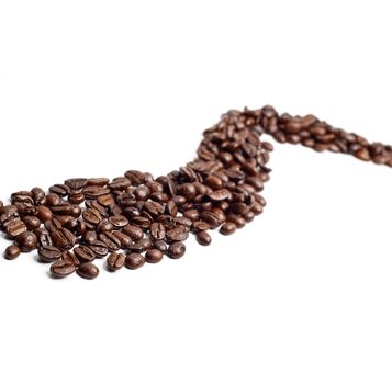 bounch of roasted coffee beans mimic a road shape