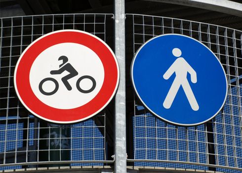 Traffic signs for pedestrians and no cycles
