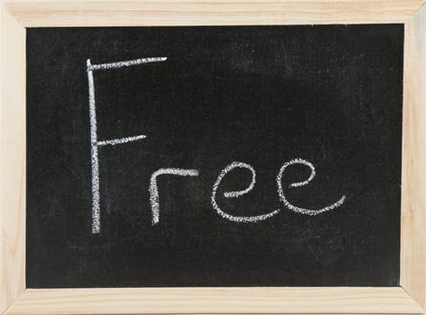 Black chalk board with wooden framed surround with the word Free