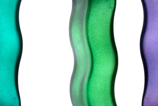 Abstract color background of backlit color glass.