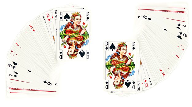 the queen of spades on card pack over white