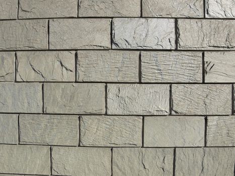 Detail of a wall of stone tiles