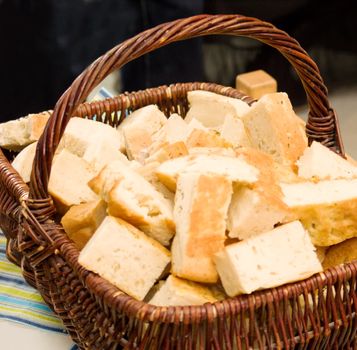 Basket of home made  bread on a table