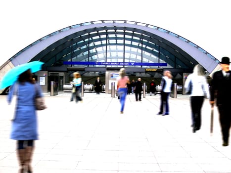 People walking to the underground station, London (high key motion blur)