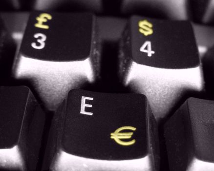 Dollar Euro Pound symbols on computer keyboard keys