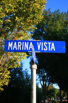 Street sign close up over blue sky.