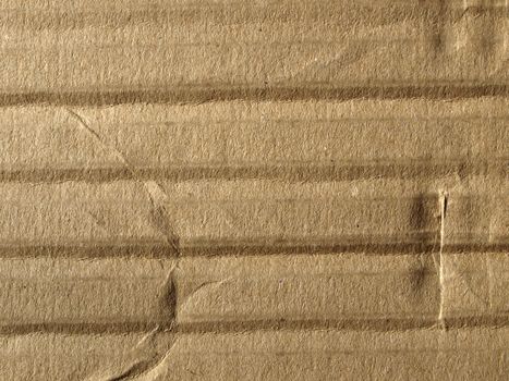 Brown corrugated cardboard sheet background material texture