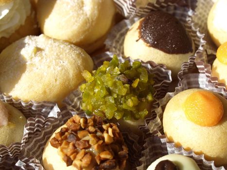 Mixed pastries with chocolate, cream, fruit