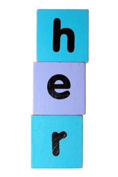 assorted childrens toy letter building blocks against a white background that spell her with clipping path