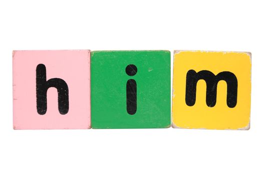 assorted childrens toy letter building blocks against a white background that spell him with clipping path