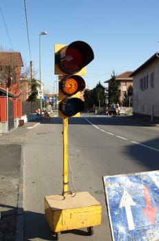 Road works with temporary traffic light