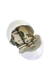 Broken egg shell with rolled up fake money to represent getting into a persons nest-egg. Isolated with a clipping path.