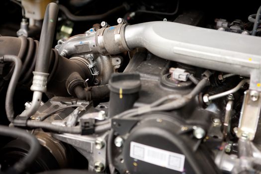 A detail of a diesel motor with focus on the turbo