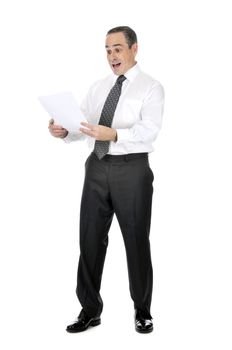 Business man in suit reading papers with expression of horror