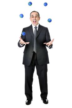 Business man in suit juggling planet earth balls