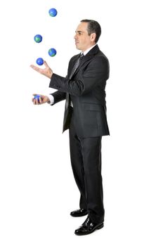 Business man in suit juggling planet earth balls
