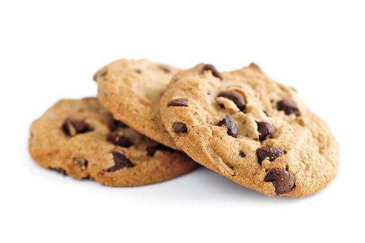 Tall stack of chocolate chip cookies isolated on white background