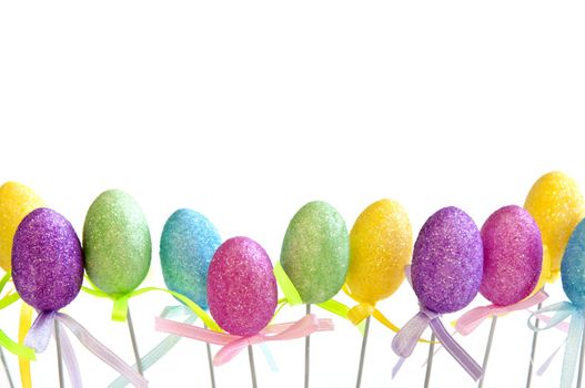 Cute Easter toy eggs isolated on white background