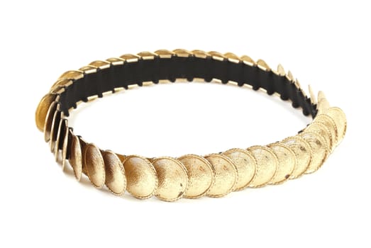 Golden colored female belt. Isolated on white background