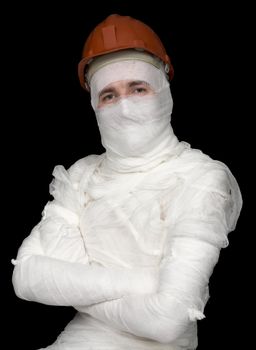 Guy in bandage with the helmet on black
