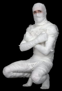 Man in bandage on the black background