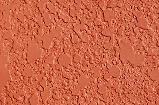 Textured wall with an earthtone color paint 