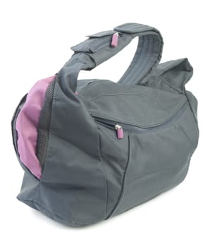 Nylon luggage with pink parts. Isolated on white background