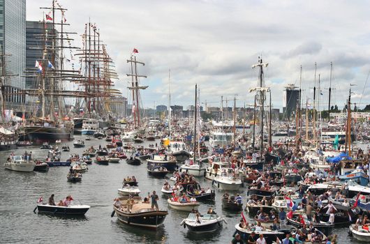 AMSTERDAM, AUGUST 19, 2010: Parade of little boats at Sail 2010 in Amsterdam, Holland on august 19, 2010