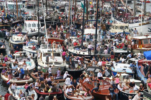 AMSTERDAM, AUGUST 19, 2010: Parade of little boats at Sail 2010 in Amsterdam, Holland on august 19, 2010