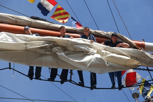 AMSTERDAM, AUGUST 19, 2010: Sailers of Russian tall ship Sedov at Sail 2010 in Amsterdam, Holland on august 19, 2010