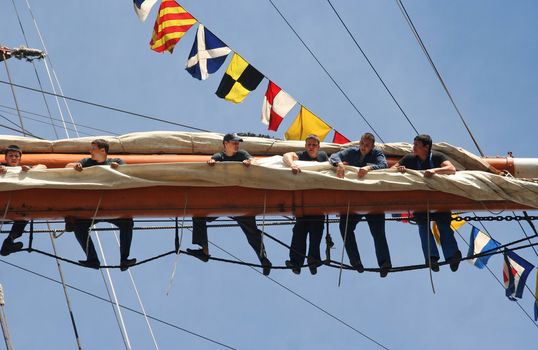 AMSTERDAM, AUGUST 19, 2010: Sailers of Russian tall ship Sedov at Sail 2010 in Amsterdam, Holland on august 19, 2010