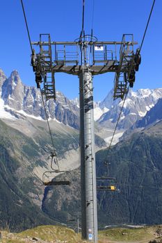 chair lift and mountain and sky blue