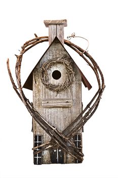 Weathered wooden birdhouse, isolated on white background