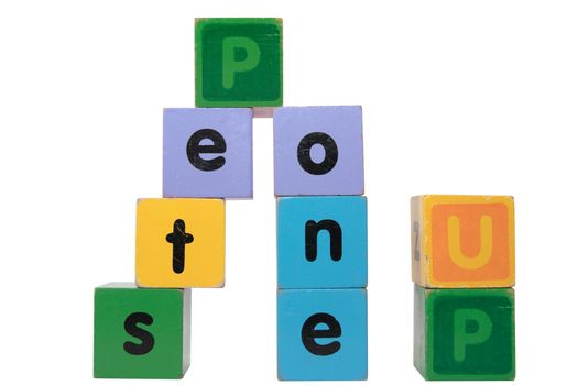 toy letters that spell step one up against a white background with clipping path