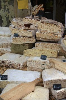 Pieces of fresh nougat on a french market. Nougat is a local product of Southern France