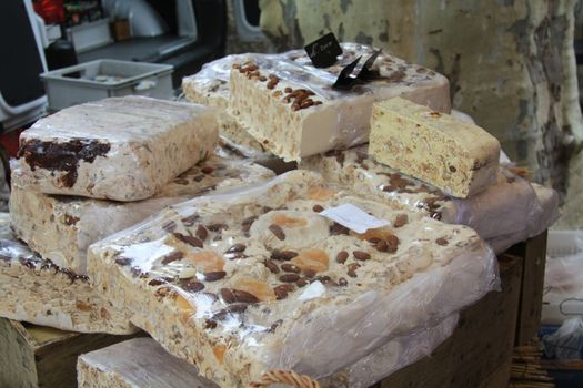 Pieces of fresh nougat on a french market. Nougat is a local product of Southern France