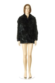 Female mannequin in short black fur coat. Isolated on white background