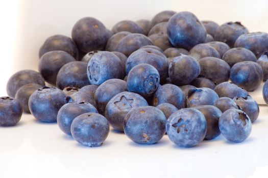 high key closeup of blueberries with a shallow dof